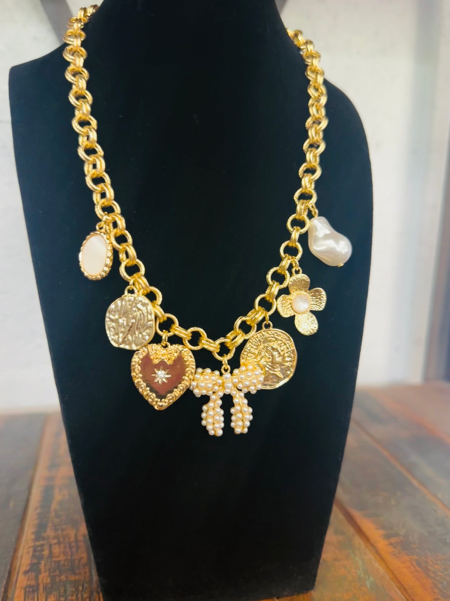 Gold Bow Multi Charm Necklace